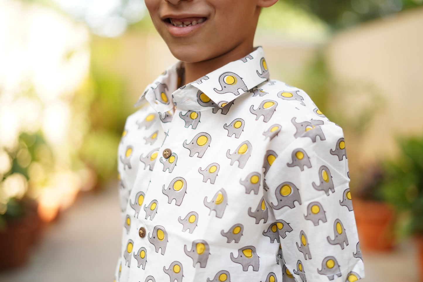 White shirt with cute grey elephant