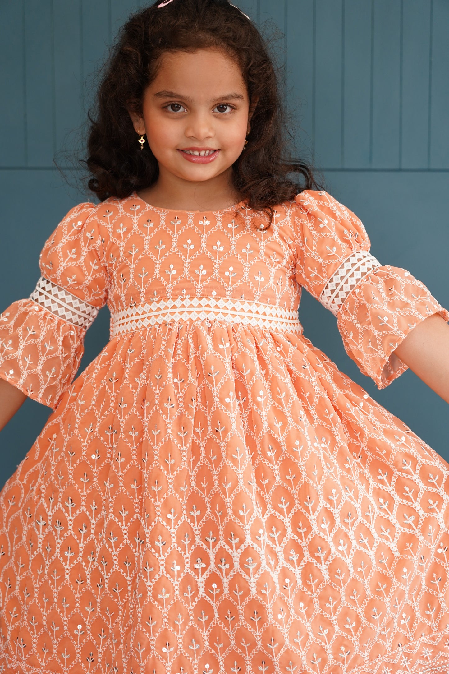 Peach Lukhnowi Georgette frock