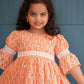 Peach Lukhnowi Georgette frock