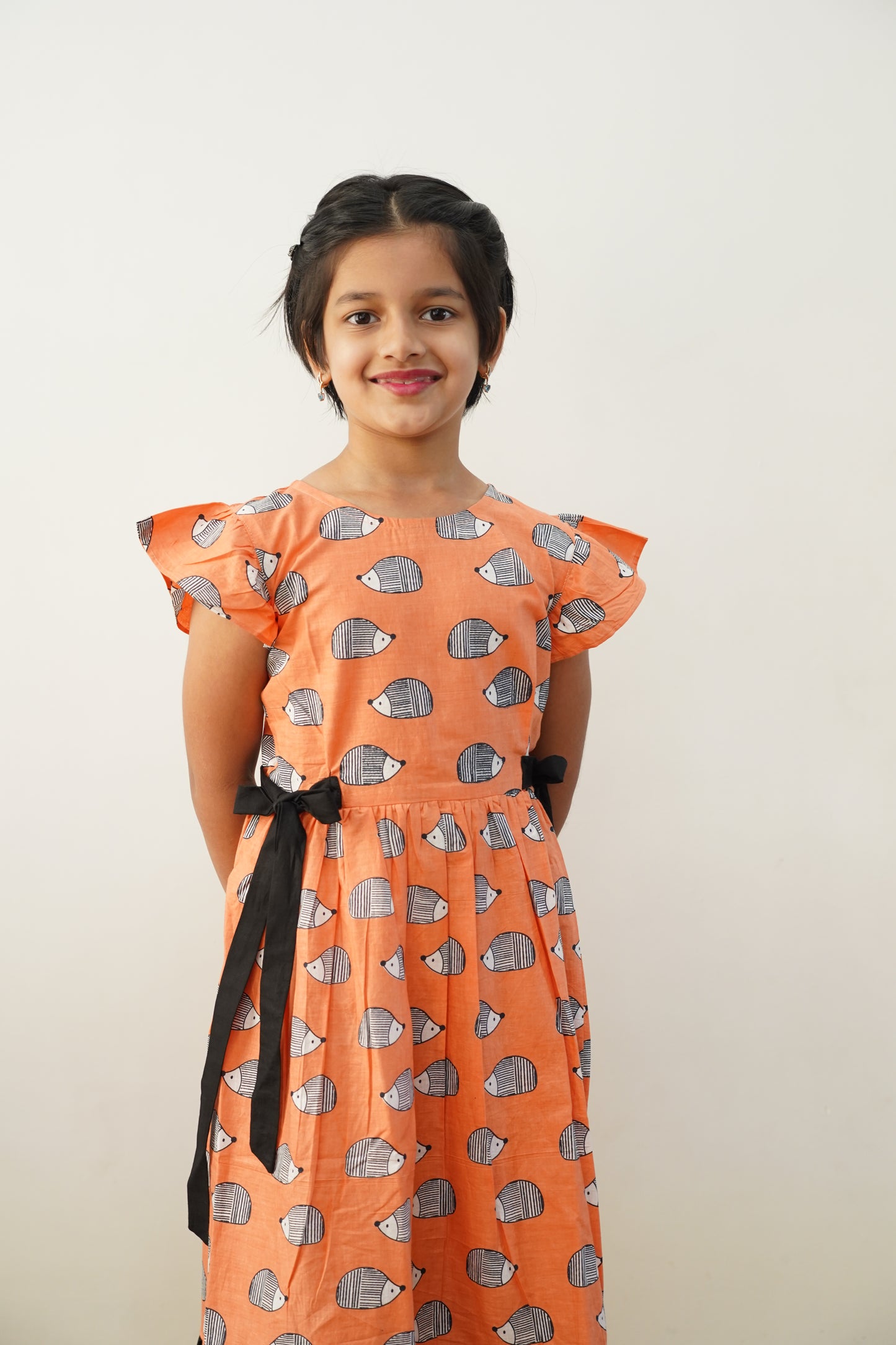 Peach porcupine print frock