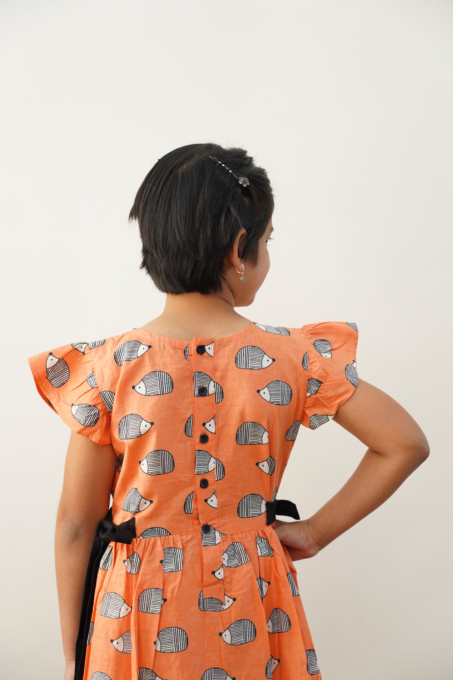 Peach porcupine print frock