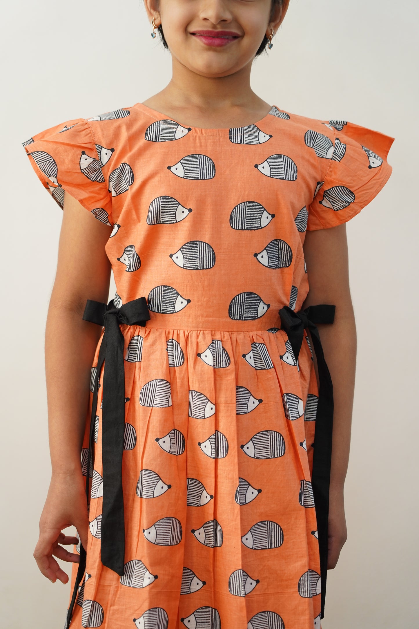 Peach porcupine print frock